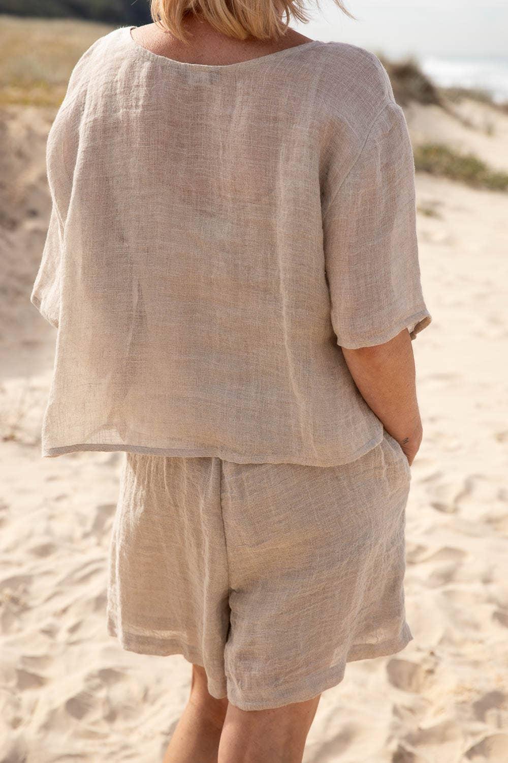 Eadie Lifestyle Olivia Linen Top worn by model in natural setting LUXAMORE 