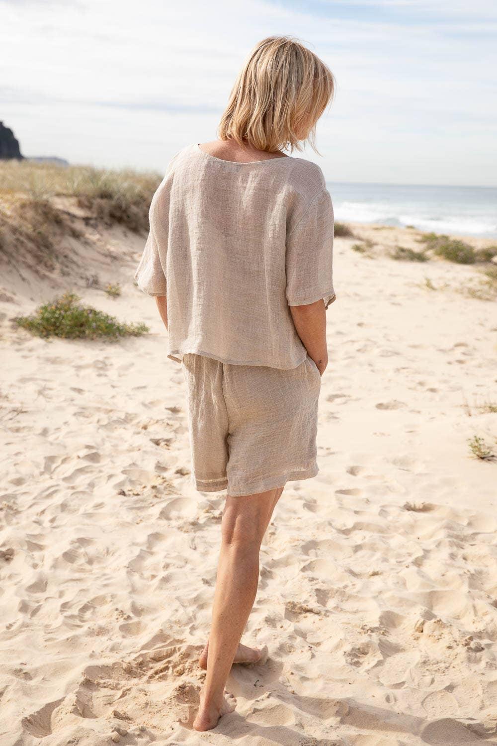 Eadie Lifestyle Olivia Linen Top worn by model in natural setting LUXAMORE 