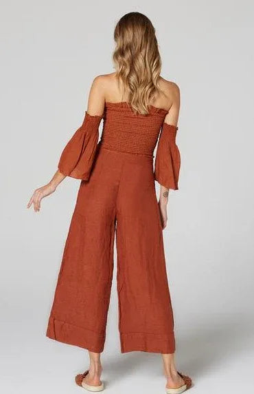 Estilo Emporio Fiorella Top - Rust worn by model in natural setting LUXAMORE 