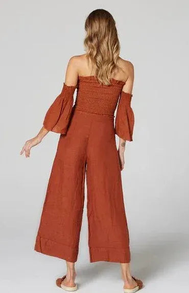 Estilo Emporio Fiorella Top - Rust worn by model in natural setting LUXAMORE 