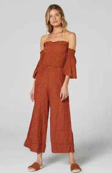 Estilo Emporio Fiorella Top - Rust worn by model in natural setting LUXAMORE 