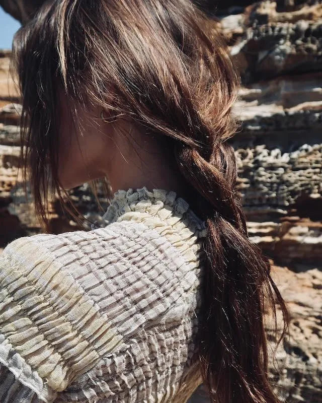 Estilo Emporio Gidget Top worn by model in natural setting LUXAMORE 