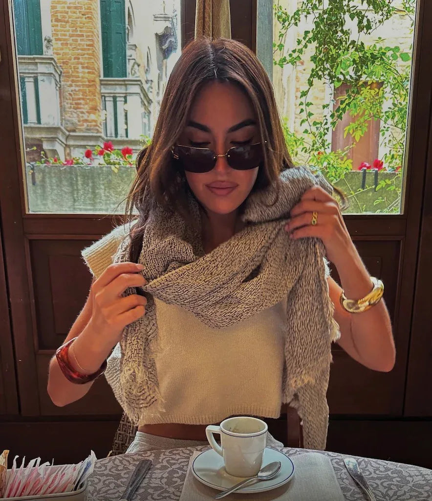 Estilo Emporio Grand Scarf - Pescatore Natural Chocolate worn by model in natural setting LUXAMORE 