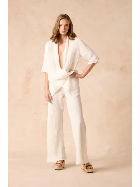 Estilo Emporio Greco Top worn by model in natural setting LUXAMORE 