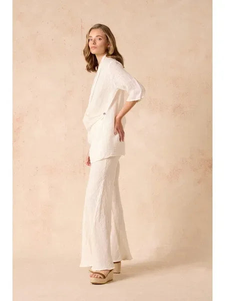 Estilo Emporio Greco Top worn by model in natural setting LUXAMORE 