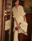 Estilo Emporio La Cota Cover Up Linen Dress worn by model in natural setting LUXAMORE 