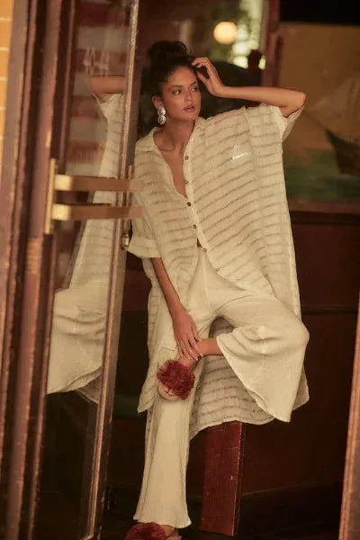 Estilo Emporio La Cota Cover Up Linen Dress worn by model in natural setting LUXAMORE 