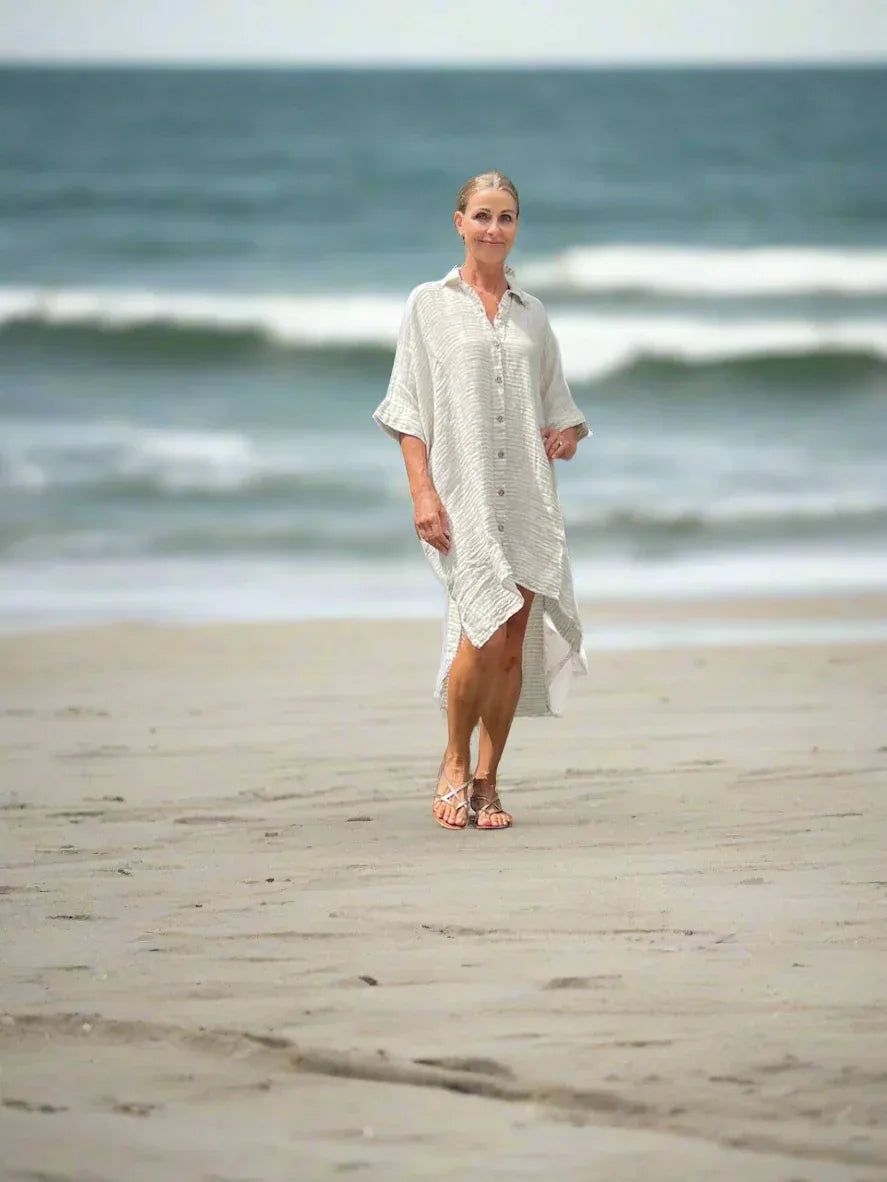 Estilo Emporio La Cota Cover Up Linen Dress Lyla worn by model in natural setting LUXAMORE 