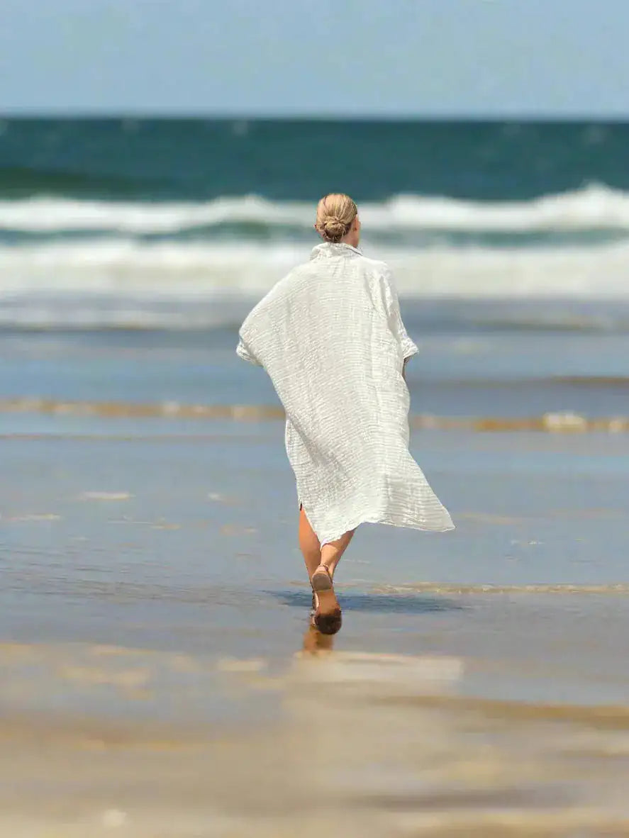 Estilo Emporio La Cota Cover Up Linen Dress Lyla worn by model in natural setting LUXAMORE 