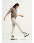 Estilo Emporio Linen Pant Stretch- Natural worn by model in natural setting LUXAMORE 