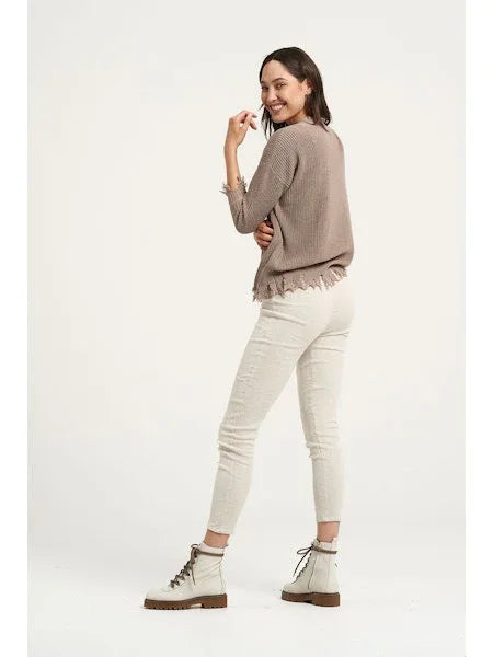 Estilo Emporio Linen Pant Stretch- Natural worn by model in natural setting LUXAMORE 