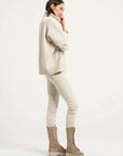 Estilo Emporio Linen Pant Stretch- Natural worn by model in natural setting LUXAMORE 
