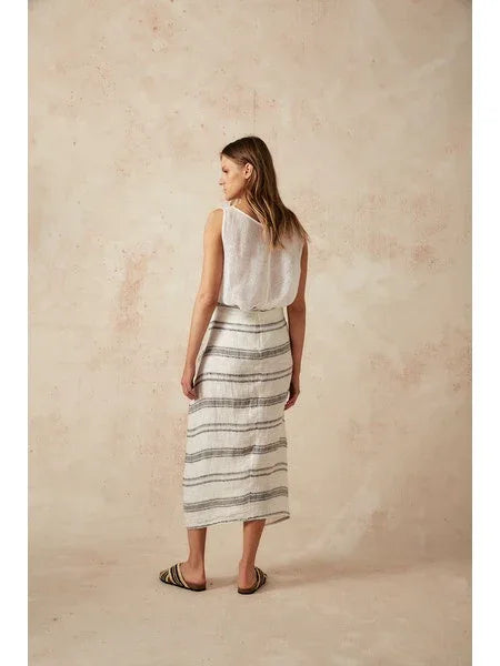 Estilo Emporio Malay Skirt - Monochroma worn by model in natural setting LUXAMORE 