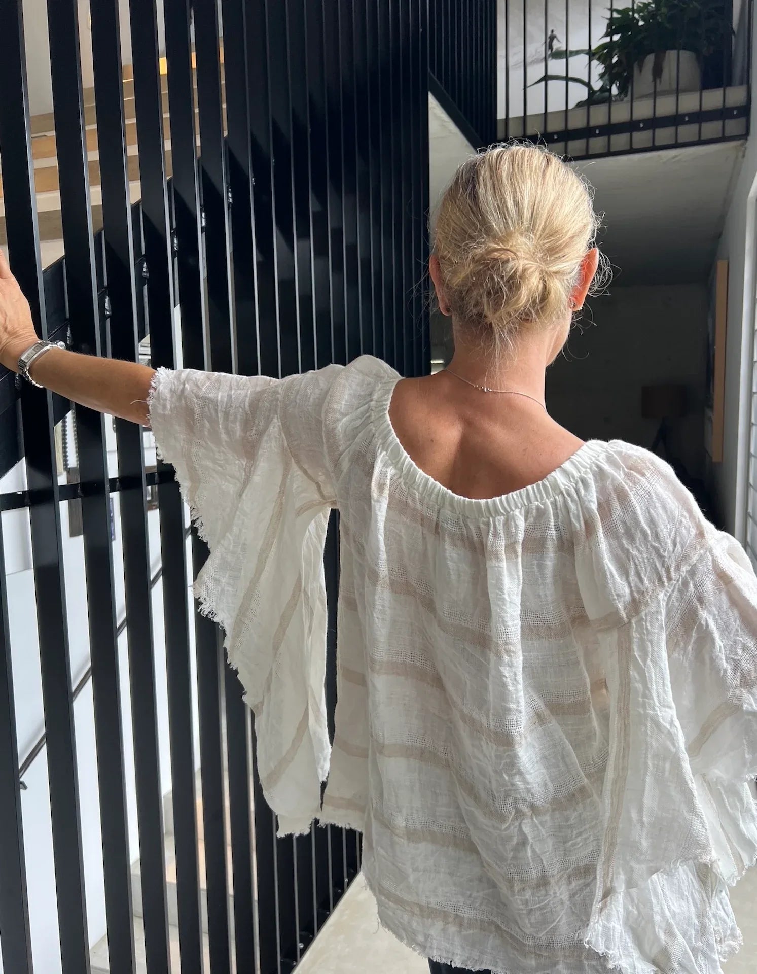 Estilo Emporio Mexicana Top worn by model in natural setting LUXAMORE 