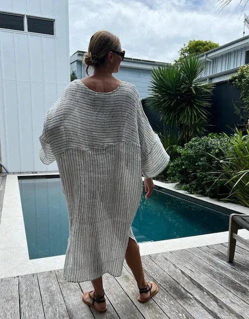 Estilo Emporio Nebbilio Linen Dress - Binario worn by model in natural setting LUXAMORE 