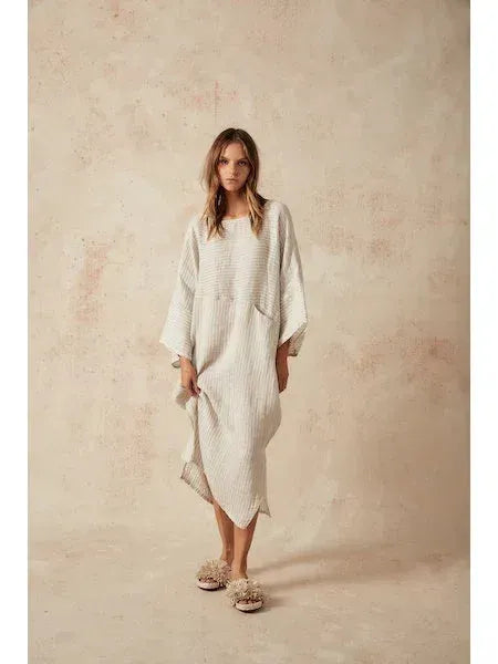 Estilo Emporio Nebbilio Linen Dress - Lyla worn by model in natural setting LUXAMORE 