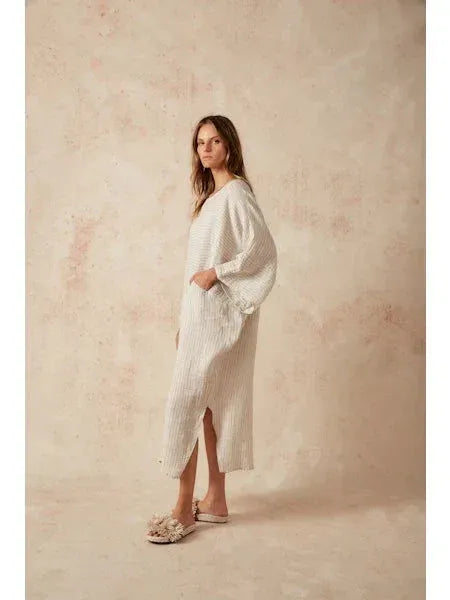 Estilo Emporio Nebbilio Linen Dress - Lyla worn by model in natural setting LUXAMORE 