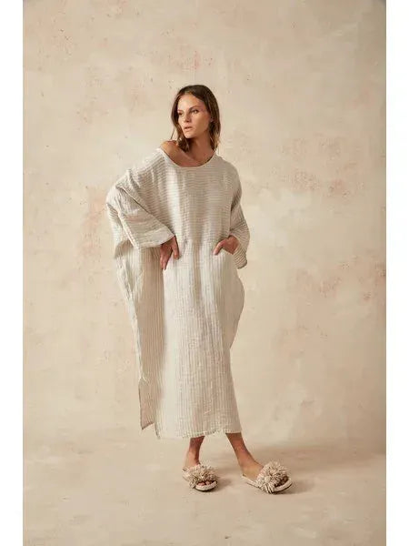 Estilo Emporio Nebbilio Linen Dress - Lyla worn by model in natural setting LUXAMORE 