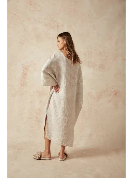 Estilo Emporio Nebbilio Linen Dress - Lyla worn by model in natural setting LUXAMORE 