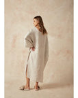 Estilo Emporio Nebbilio Linen Dress - Lyla worn by model in natural setting LUXAMORE 