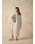 Estilo Emporio Nebbilio Linen Dress - Lyla worn by model in natural setting LUXAMORE 