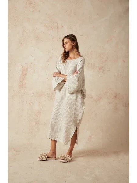 Estilo Emporio Nebbilio Linen Dress - Lyla worn by model in natural setting LUXAMORE 