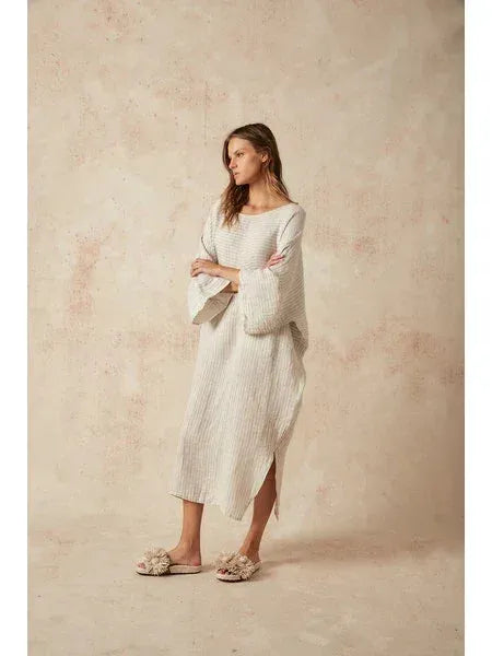 Estilo Emporio Nebbilio Linen Dress - Lyla worn by model in natural setting LUXAMORE 