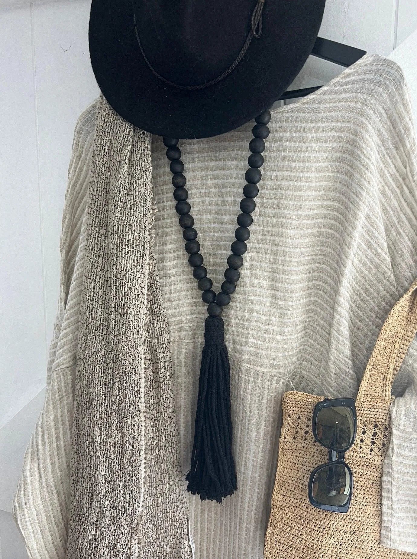 Estilo Emporio Nebbilio Linen Dress - Lyla worn by model in natural setting LUXAMORE 