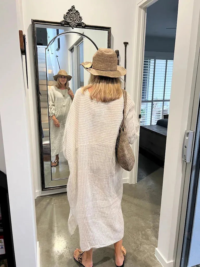 Estilo Emporio Nebbilio Linen Dress - Lyla worn by model in natural setting LUXAMORE 