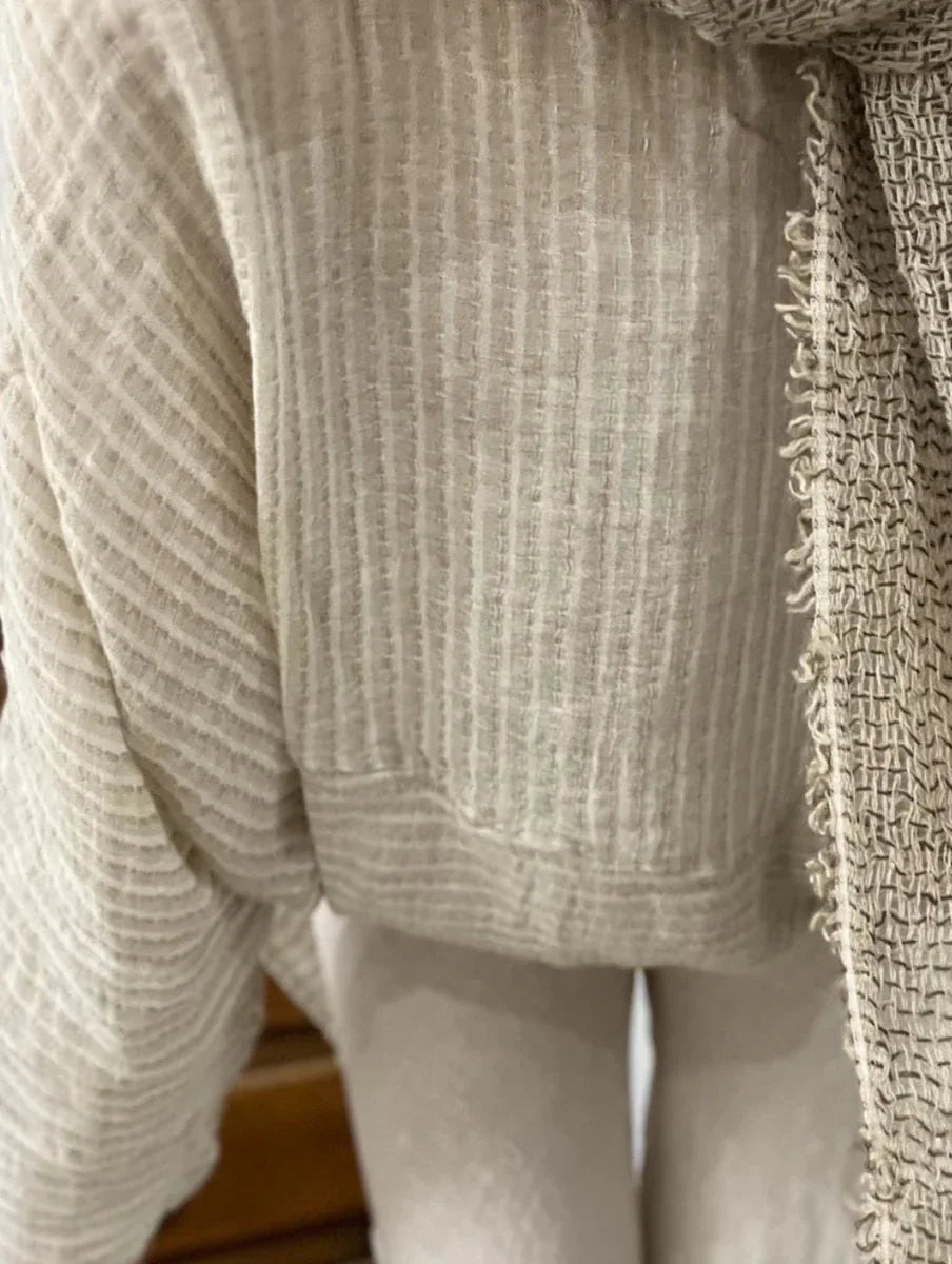 Estilo Emporio Nerano Top worn by model in natural setting LUXAMORE 