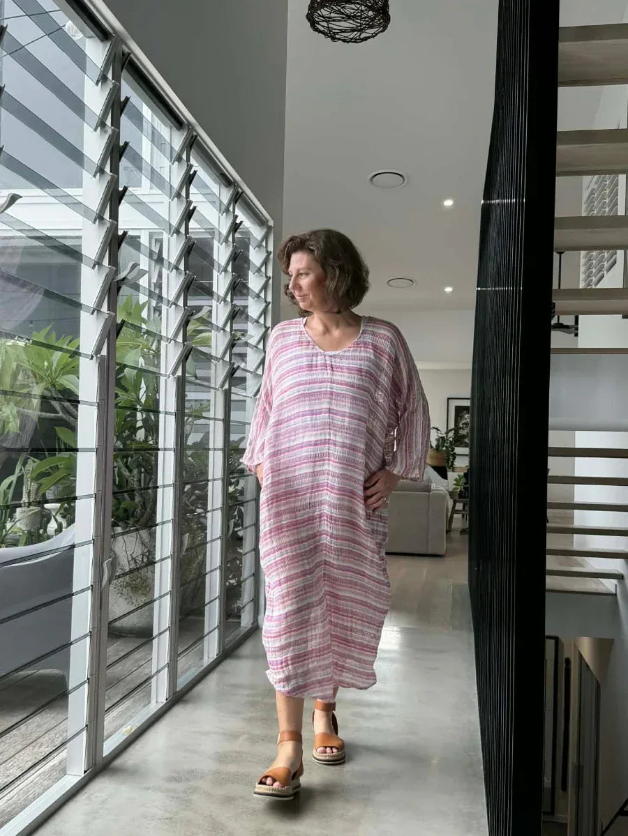 Estilo Emporio Neve Dress worn by model in natural setting LUXAMORE 