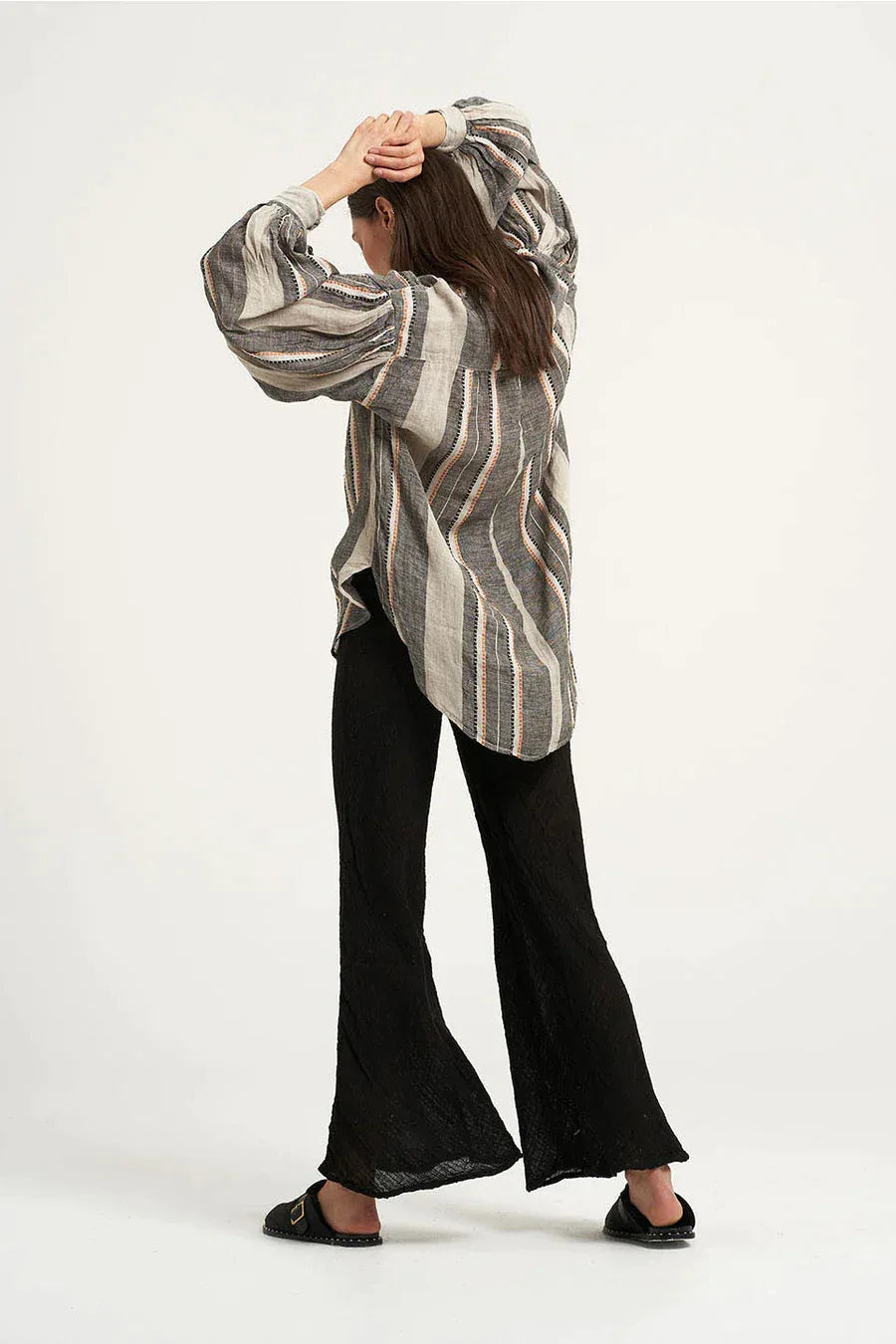 Pre Order Estilo Emporio Linen Pant Novo Flare - Black worn by model in natural setting LUXAMORE 