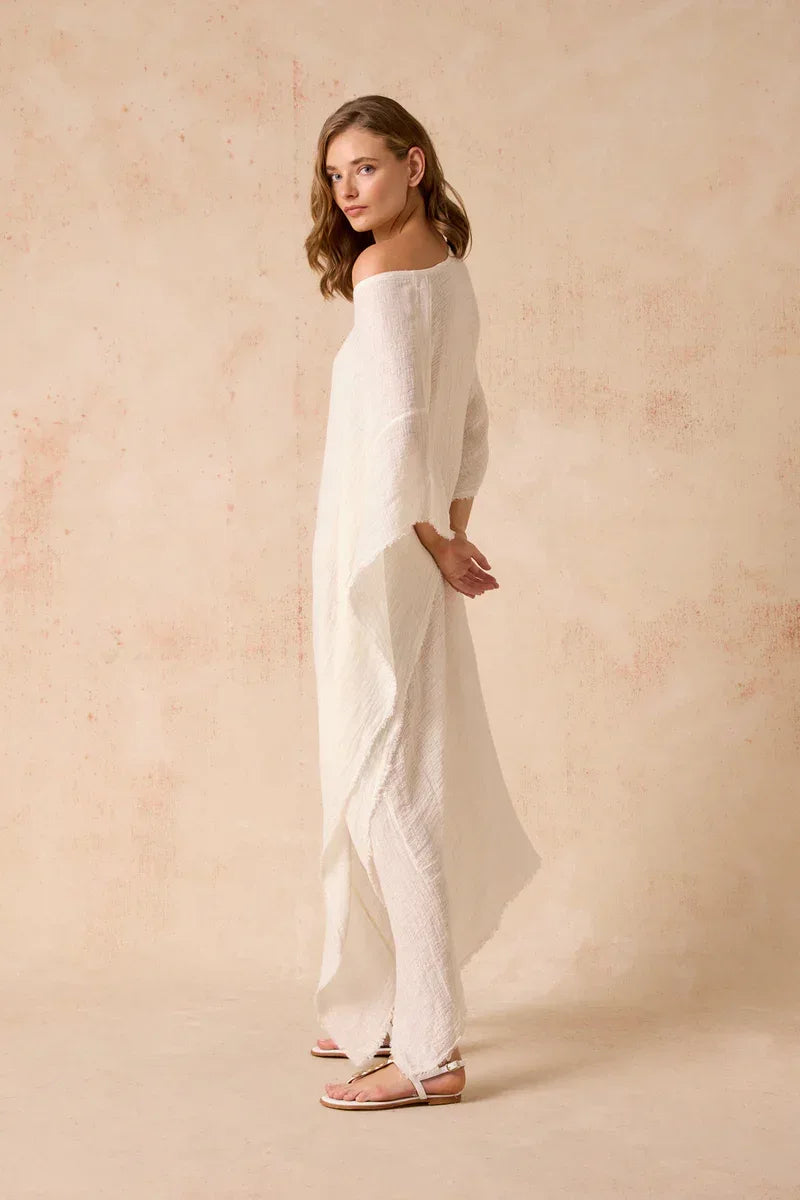 Estilo Emporio Polla Maxi Dress in Exclusive Rete Anthracite worn by model in natural setting LUXAMORE 