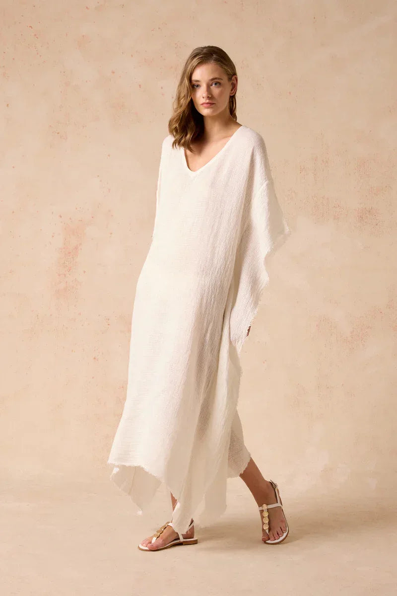 Estilo Emporio Polla Maxi Dress in Exclusive Rete Anthracite worn by model in natural setting LUXAMORE 