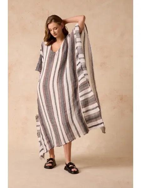 Estilo Emporio Polla Maxi Kaftan Dark Chocolate Stripe worn by model in natural setting LUXAMORE 