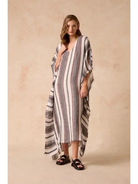 Estilo Emporio Polla Maxi Kaftan Dark Chocolate Stripe worn by model in natural setting LUXAMORE 