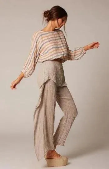 Estilo Emporio Poppy Top worn by model in natural setting LUXAMORE 