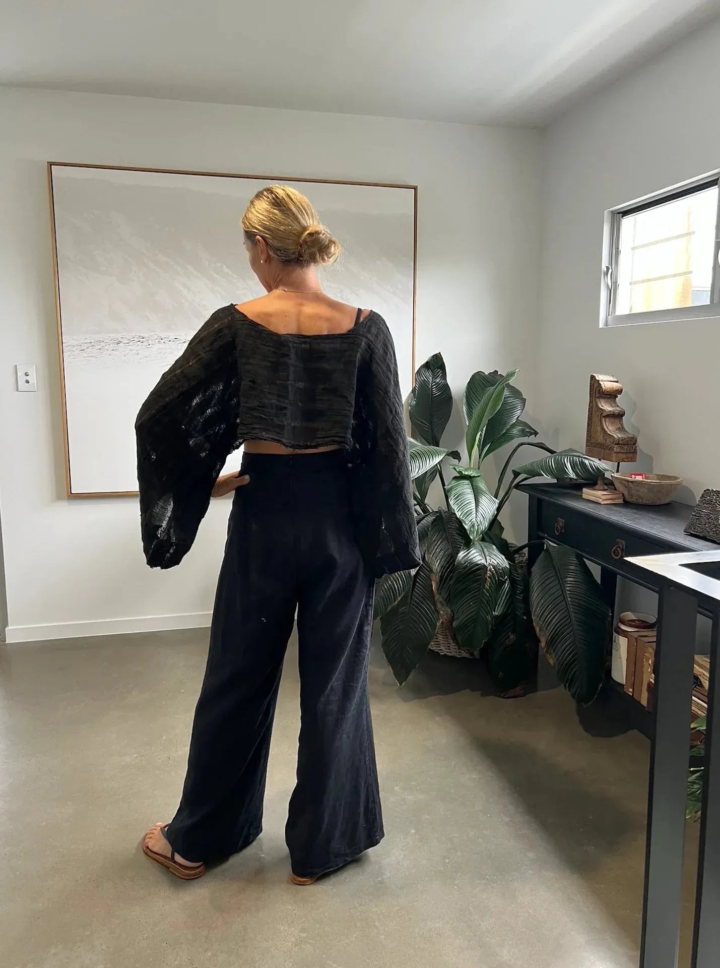 Estilo Emporio Raffles Top worn by model in natural setting LUXAMORE 