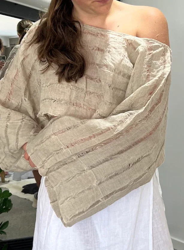 Estilo Emporio Raffles Top worn by model in natural setting LUXAMORE 