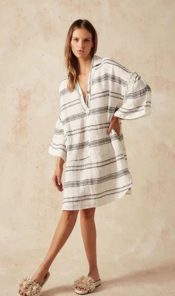 Estilo Emporio Siesta Mini Linen Dress - Lyla worn by model in natural setting LUXAMORE 