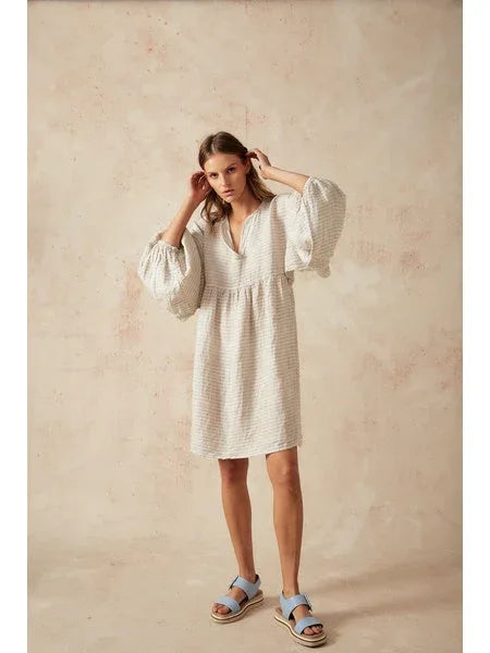 Estilo Emporio Stella Linen Dress - Lyla worn by model in natural setting LUXAMORE 