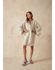 Estilo Emporio Stella Linen Dress - Lyla worn by model in natural setting LUXAMORE 