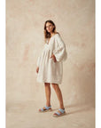 Estilo Emporio Stella Linen Dress - Lyla worn by model in natural setting LUXAMORE 