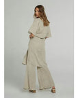 Estilo Emporio Tie Kimono - Scorpione Natural worn by model in natural setting LUXAMORE 