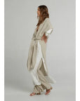 Estilo Emporio Tie Kimono - Scorpione Natural worn by model in natural setting LUXAMORE 