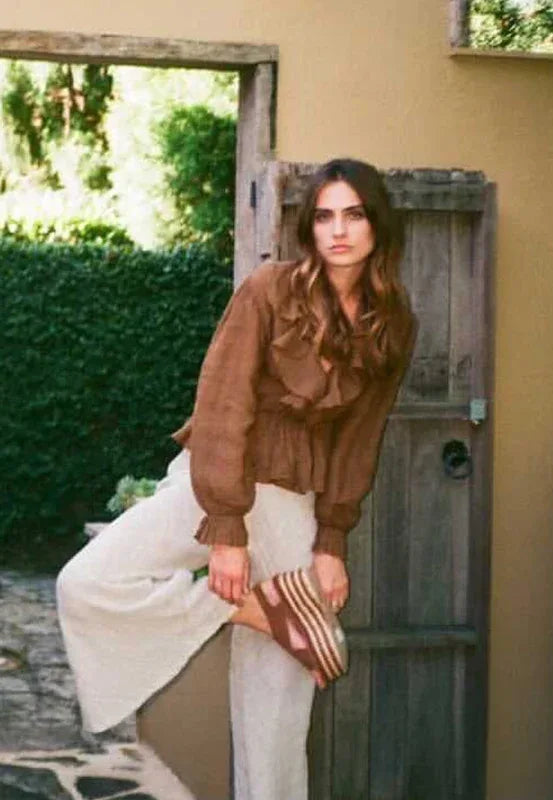 Estilo Emporio Tome Blouse - Tobacco worn by model in natural setting LUXAMORE 