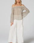 Estilo Emporio Twiggy Off The Shoulder Top worn by model in natural setting LUXAMORE 