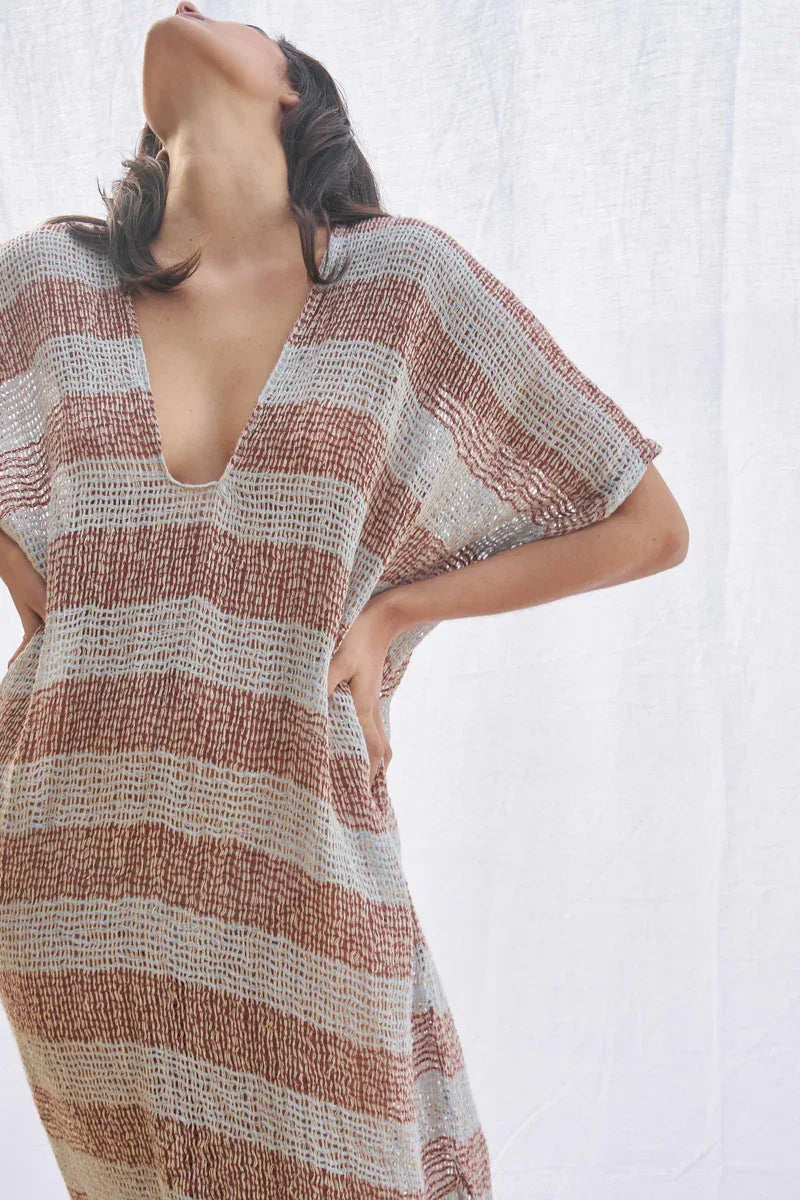 Estilo Emporio Zaza Dress Sky Blue Chocolate worn by model in natural setting LUXAMORE 