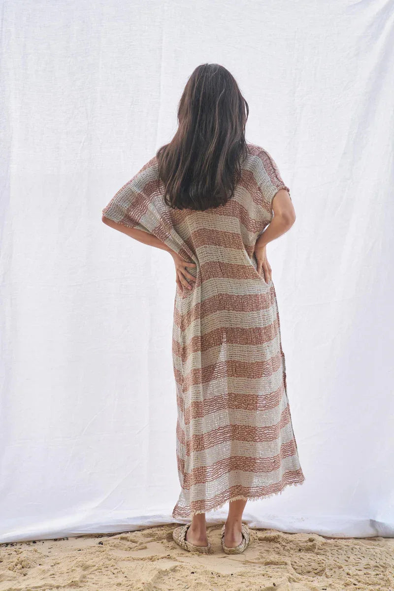 Estilo Emporio Zaza Dress Sky Blue Chocolate worn by model in natural setting LUXAMORE 