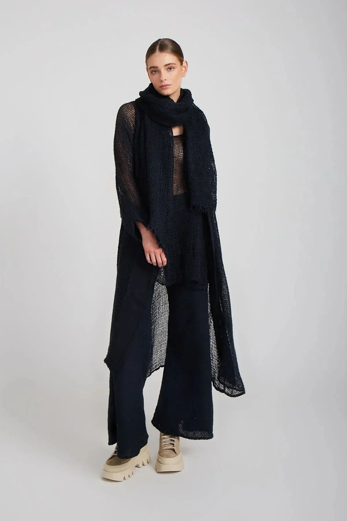 Pre Order Estilo Emporio Linen Pant Novo Flare - Black worn by model in natural setting LUXAMORE 